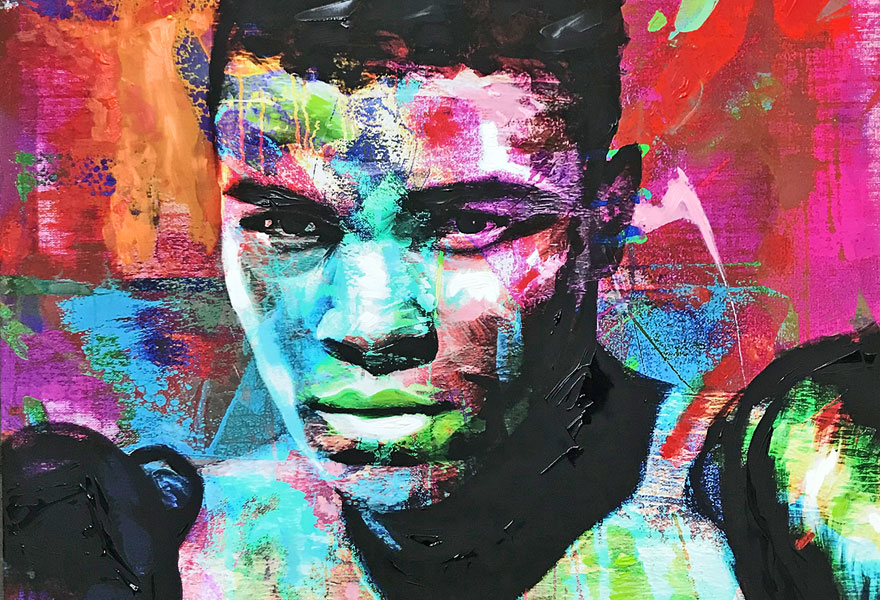 On display is a painted portrait of the former world boxing champion Muhammad Ali.