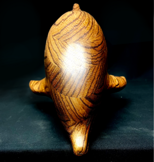 Sculpture "Dolphin made of zebrano wood" (2022)