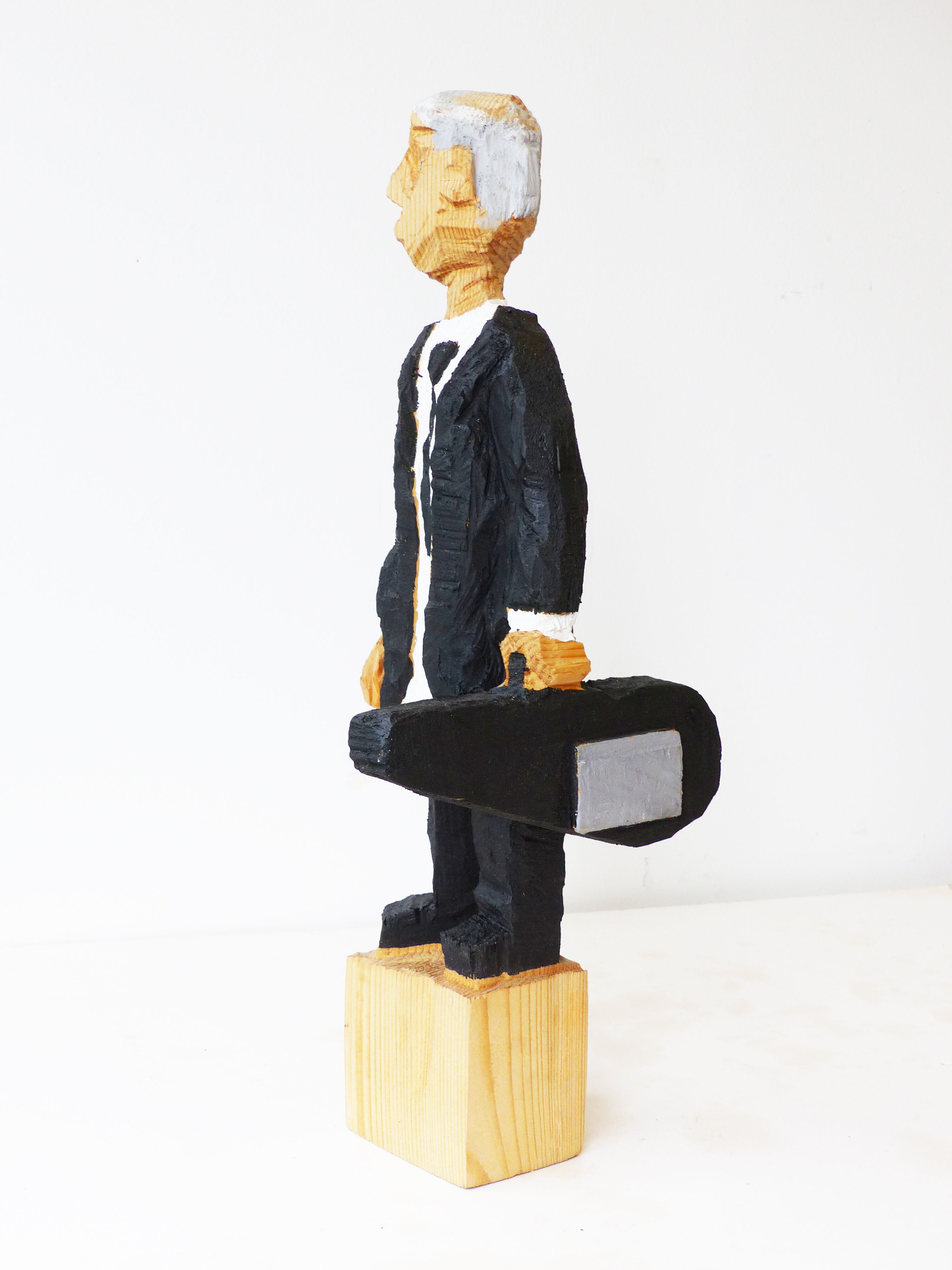 Sculpture "Violinist with case" (2019)