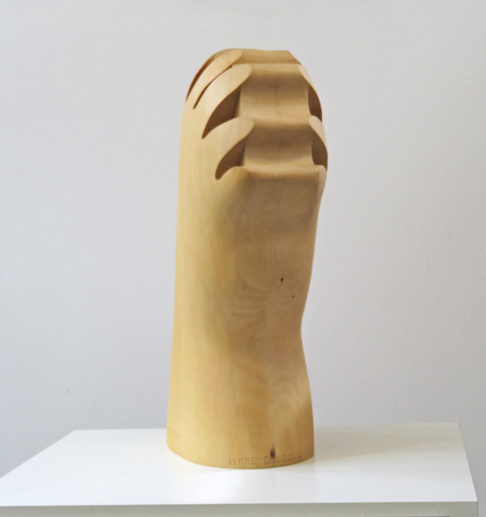 Sculpture "Small head hand" (2000)